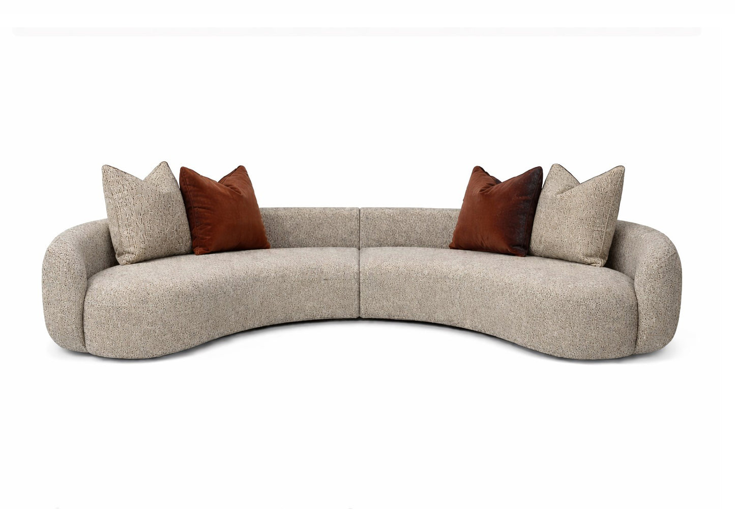 Curved beige sofa with brown and red cushions Miami store interior designer 