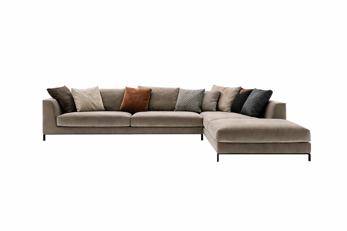 Beige sectional sofa with multicolored cushions on a white background