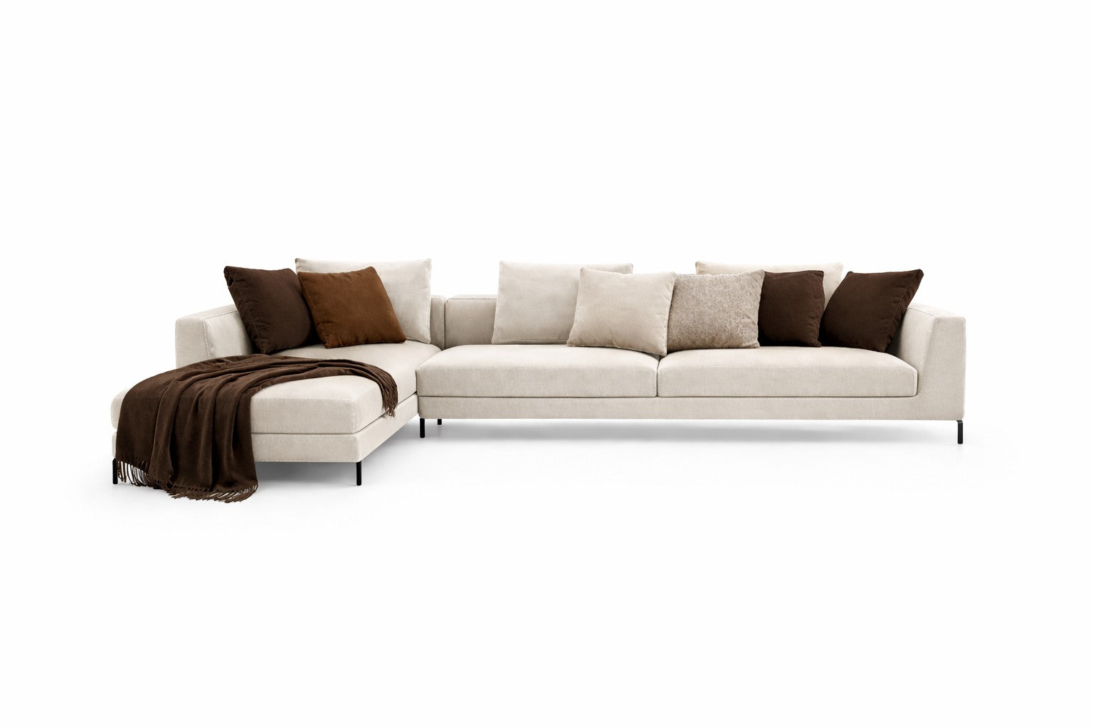 White chenille  sectional sofa with brown cushions and a blanket designer aesthetics 